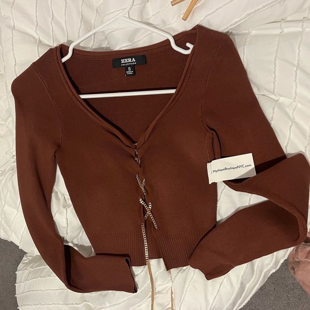 HERA gold cross cardigan